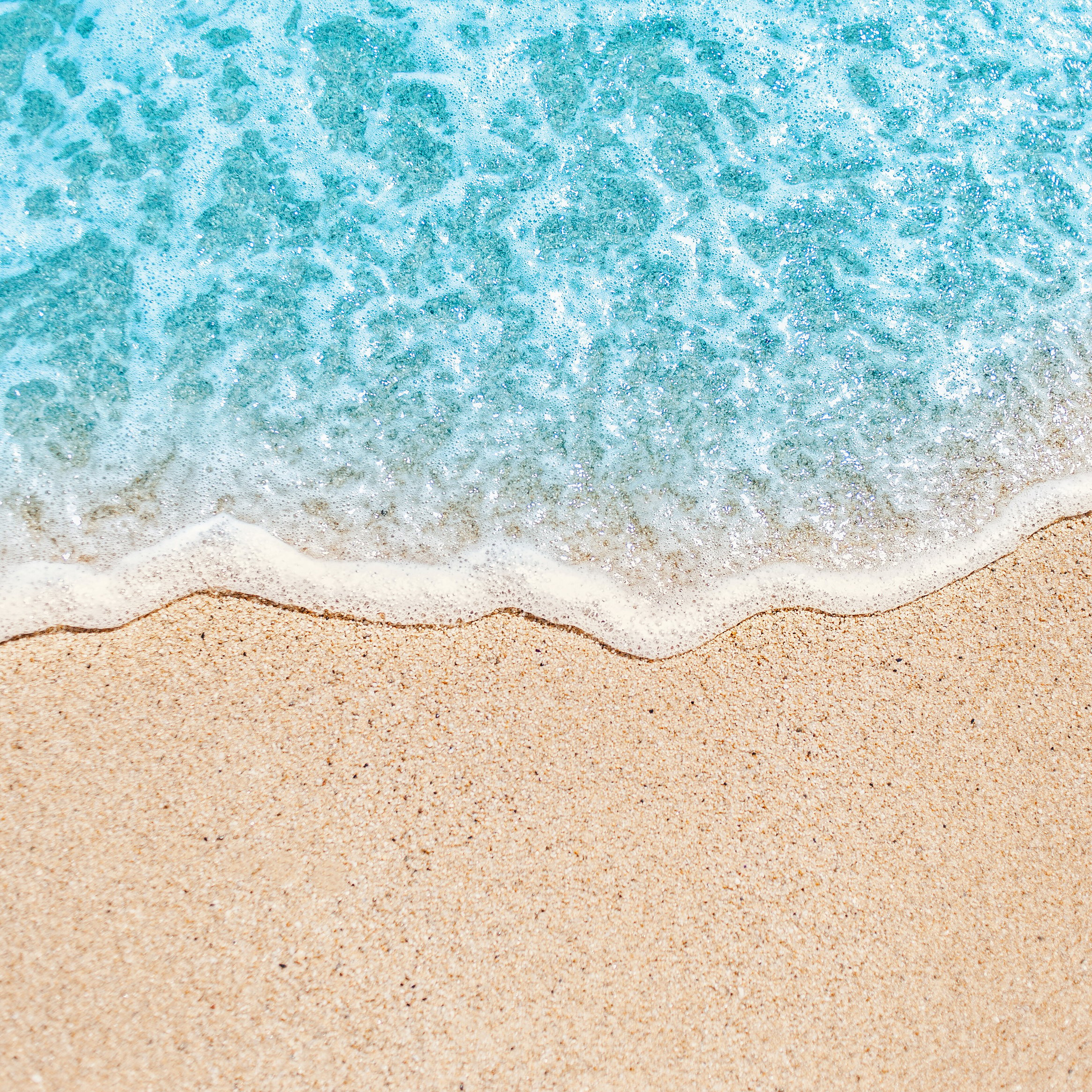 Soft Wave of Blue Ocean on Sandy Beach 