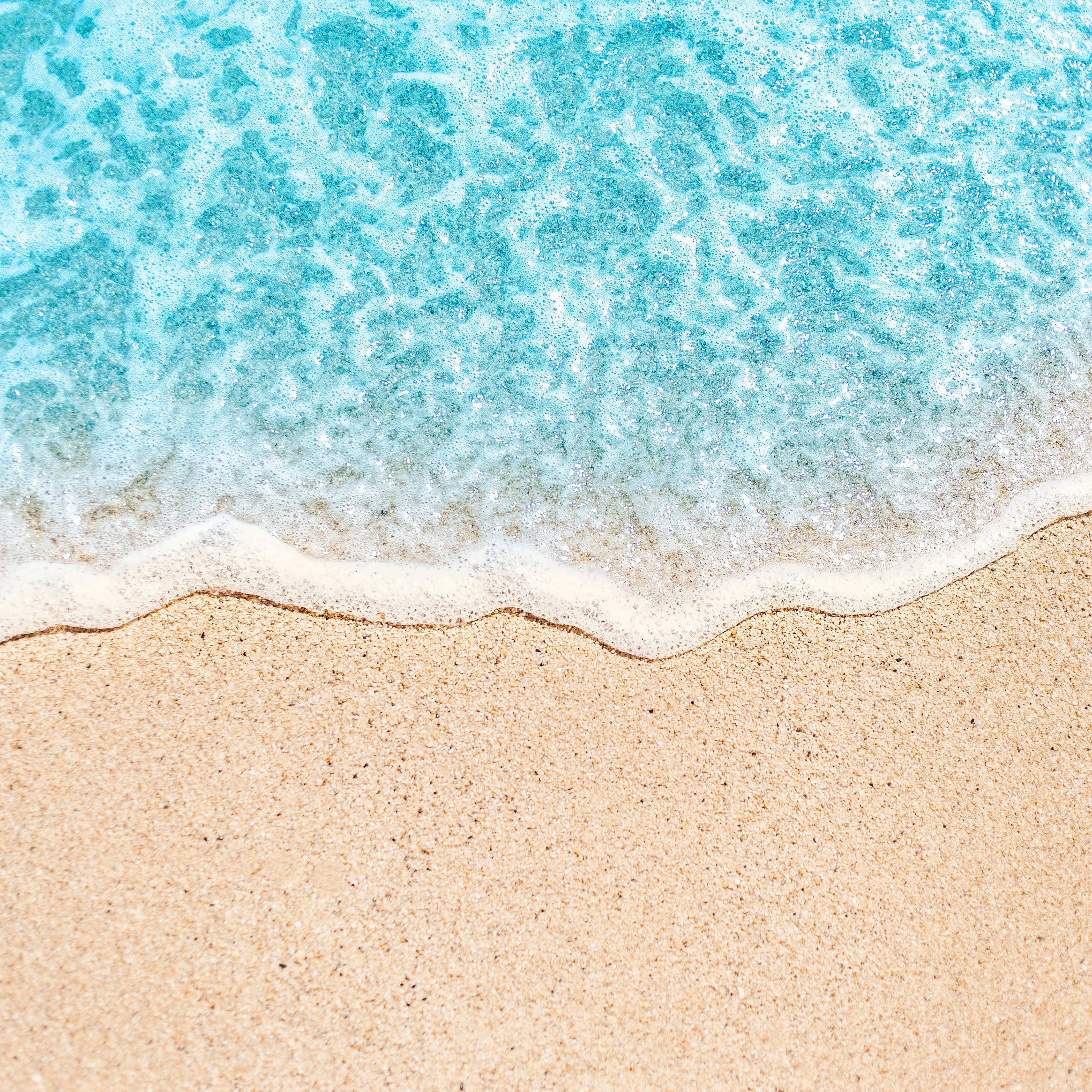 Soft Wave of Blue Ocean on Sandy Beach 